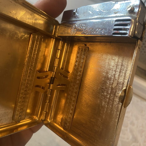 Tobacco case with petrol lighter used
