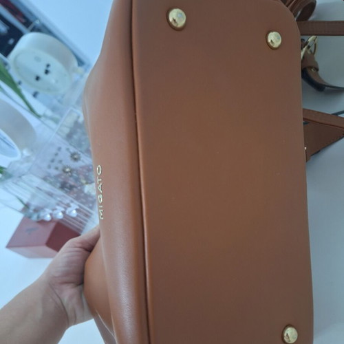 Migato backpack like new, brown