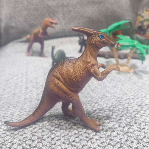 Dinosaur figure set like new, 9 figures with trees and sticks