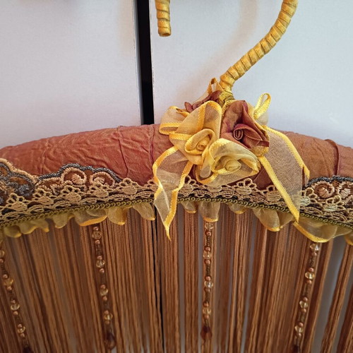 Vintage hanger and box in cinnamon orange color