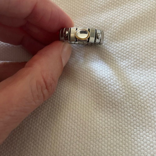 Stainless steel ring with gold detail and clear stone like new