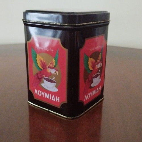 Collectible metal Loumidis Papagalos Greek coffee tin used