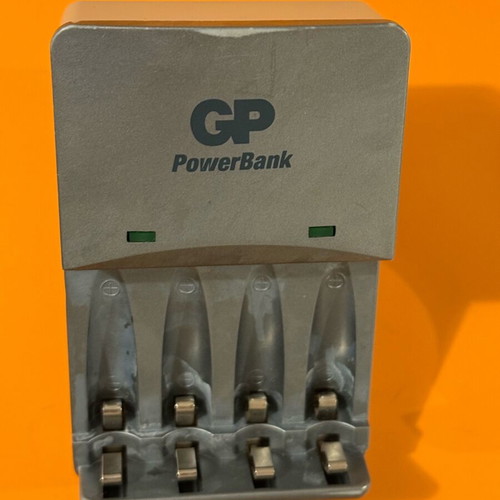 Set of 2 used battery chargers for AA, AAA and 9V