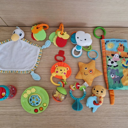 Baby toys like rattles, teethers and soft activity books, like new