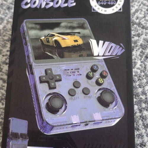 R36S handheld console like new with thousands of games