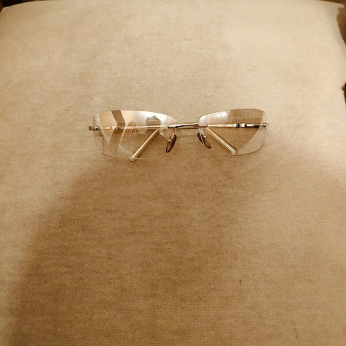 Salvatore Ferragamo sunglasses authentic, like new, clear silver rimless
