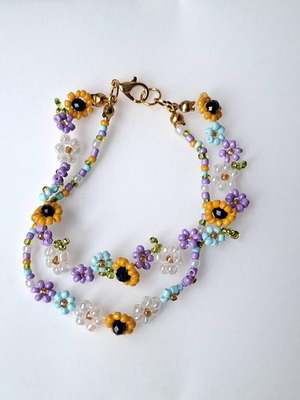 Women's handmade multicolor bracelet with gold tone