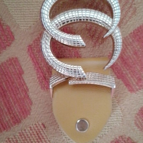 Belt buckle used, mustard color