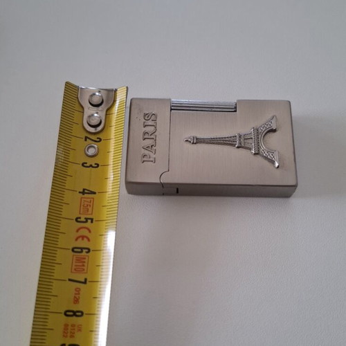Gas lighter with Eiffel Tower design, like new