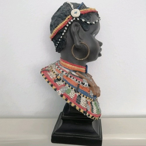 African figurine like new with intricate bead jewelry