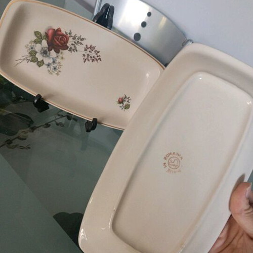Set of painted plates with roses like new, gold-trimmed edges