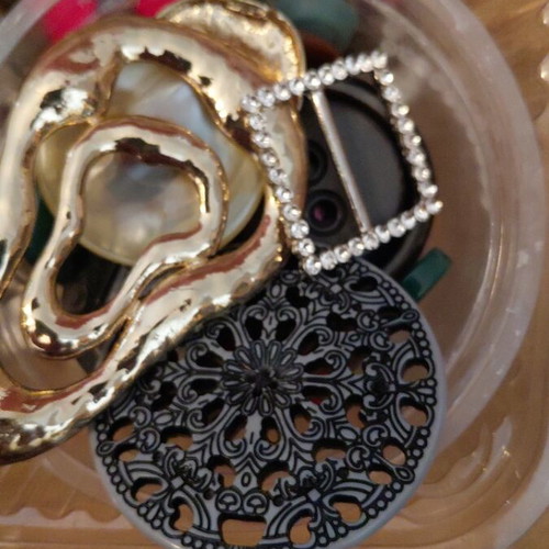 Collection of small and large buttons, beads and iron buttons