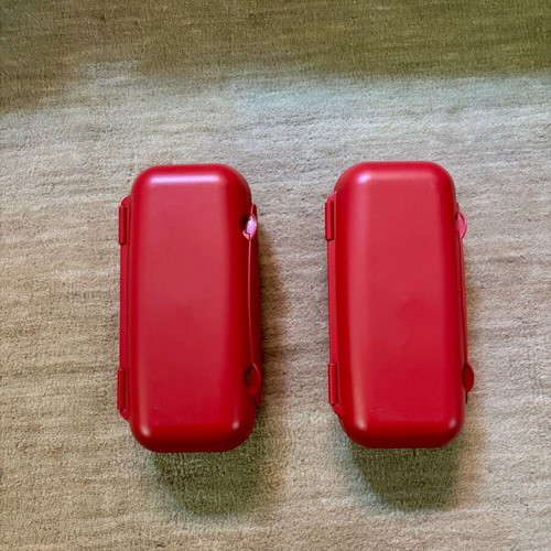 Tupperware egg holder set of 2 like new, red