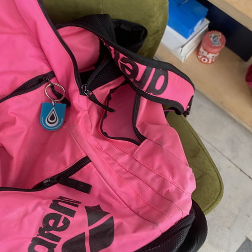 Arena pool bag with compartments used, fuchsia color