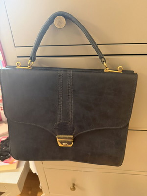 Vintage dark blue handbag with gold details used