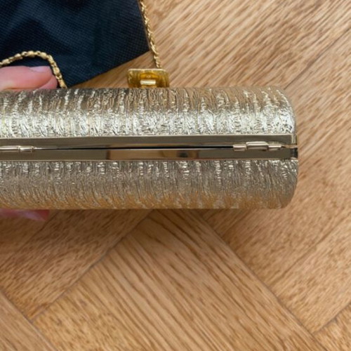 Gold clutch bag with chain strap