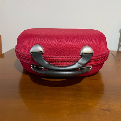 Travel toiletry bag used, red