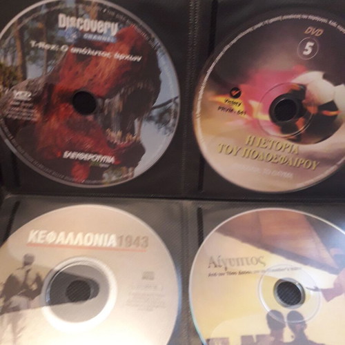 DVD collection like new, 150 discs with movies and documentaries