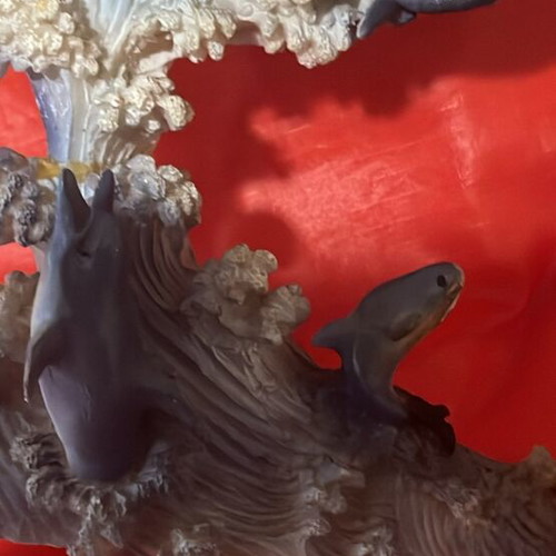 Clock used with dolphins around