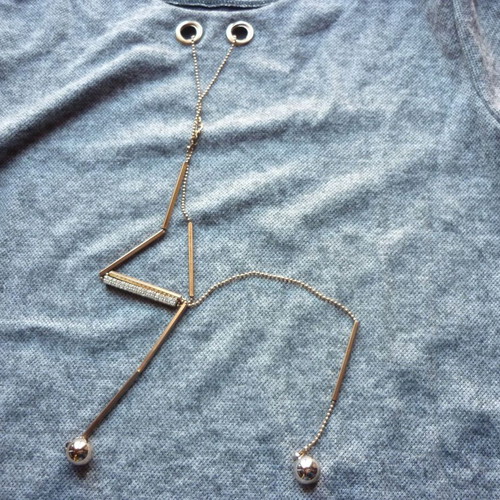 Women's blouse M/L gray like new, long back with hanging details