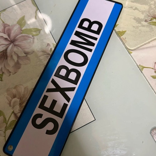 Sexbomb metal plate like new 7x26 with 2 slots