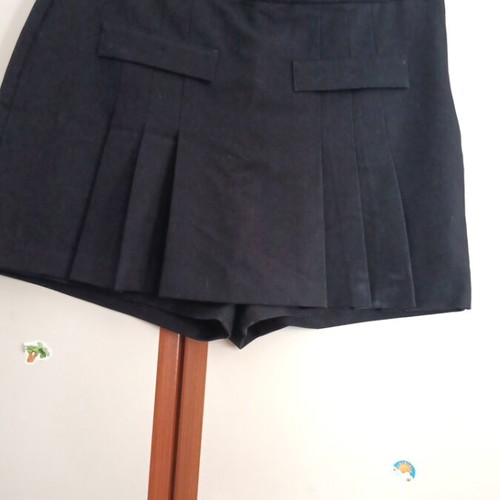Black skort with pleats and decorative pockets, like new, size XL