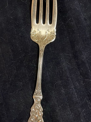 Silver-plated serving fork from 1900 like new with designs