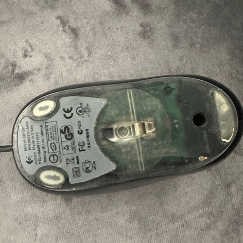 Logitech computer mouse used with free mouse pad