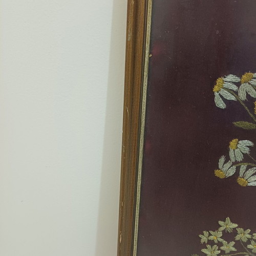 Embroidered textile painting used with silver and gold thread on velvet