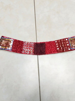 Embroidered handmade belt in burgundy red, adjustable with scratch