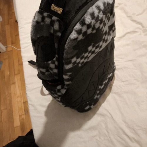 Sprayground collectible backpack, black and grey