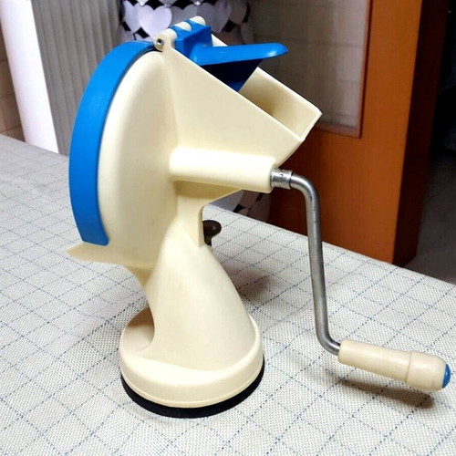 Vintage vegetable cutter used with 4 replacements and suction cup