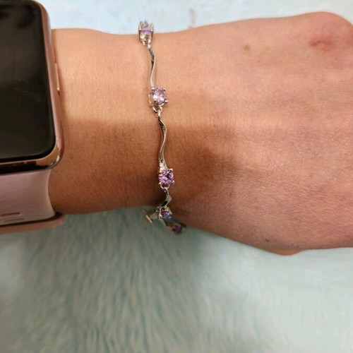 Fairy bracelet like new with purple stones and silver chain