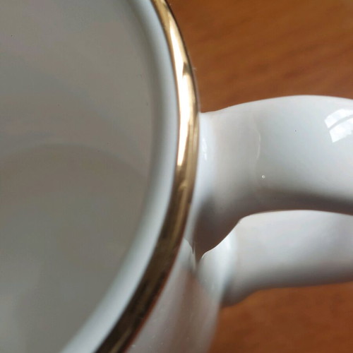 Handmade porcelain cup with 24k gold details like new