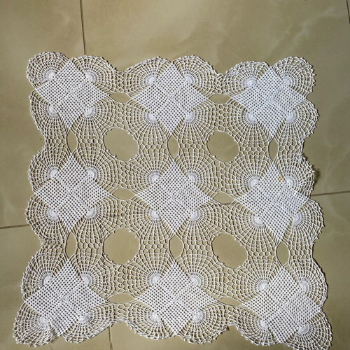 Handmade crocheted doily used with cotton thread