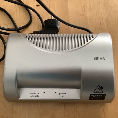 Laminating machine in excellent condition with laminating sheets