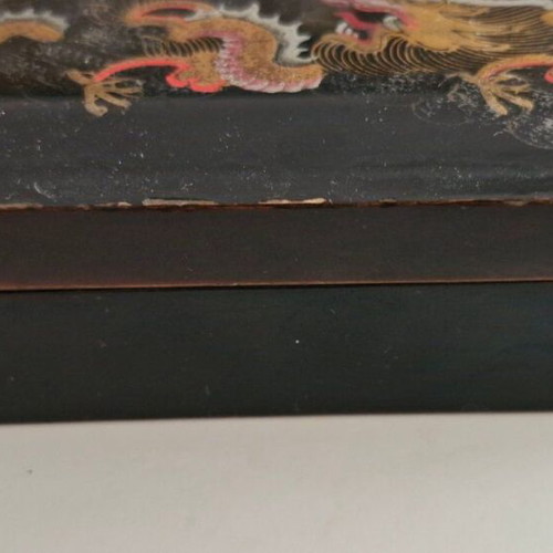 Wooden box used with painted Chinese dragon on black lacquer