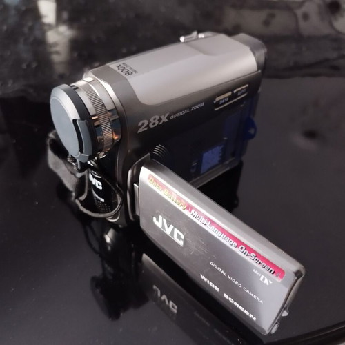 JVC GR-D725E digital video camera used with charger and case