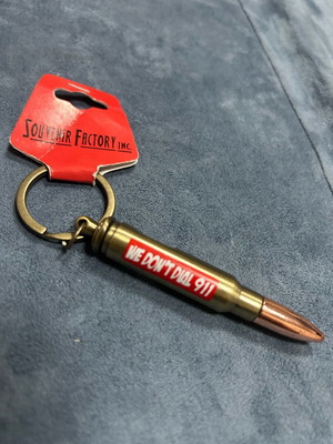 Keychain bottle opener new in ball shape “We don’t dial 911”