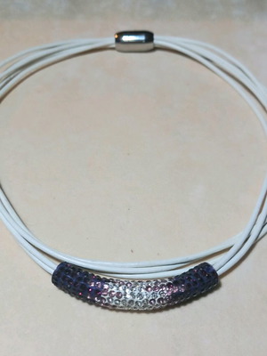 Necklace new with 5 leather strands and multicolored zirconia