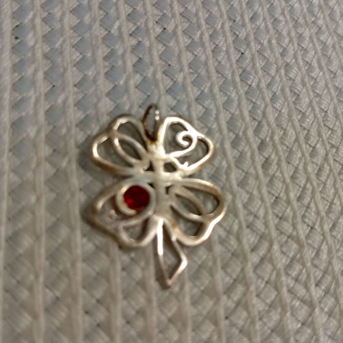Silver 925 pendant with four-leaf clover and ruby stone