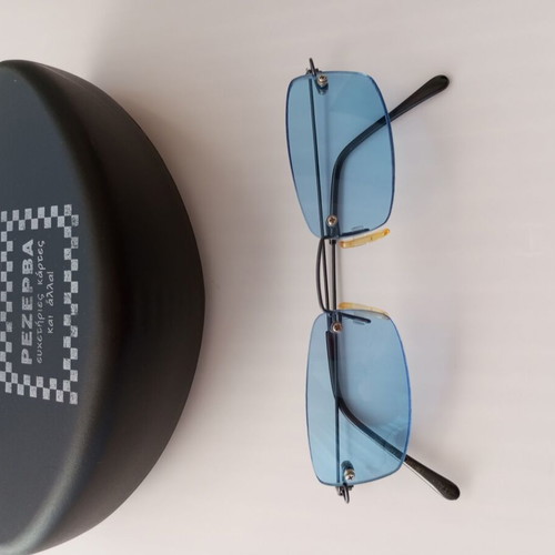 Vintage Y2K Sunglasses with Blue Lenses and Collectible PezeRva Case like new