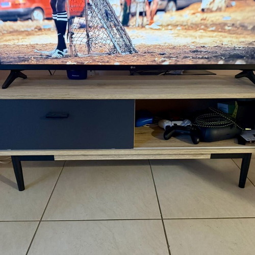 TV stand like new, natural wood with black cabinet and legs