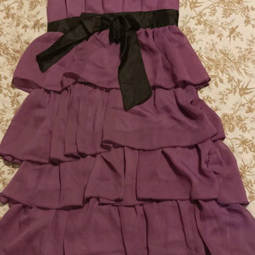 Purple dress used, with black belt