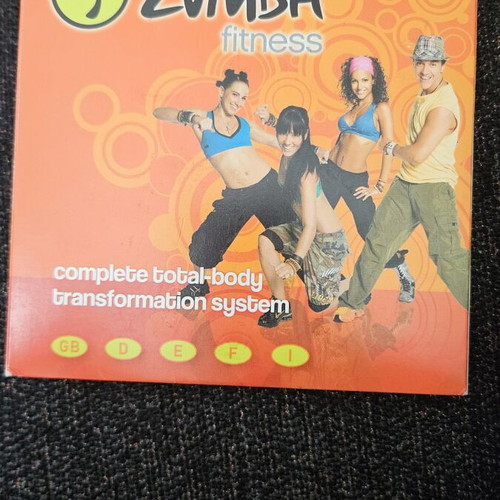 CD with dance lessons used, Zumba included with case