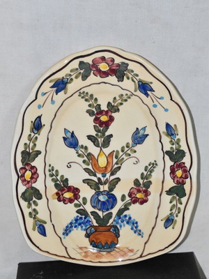 Handmade decorative clay plate used with traditional painting