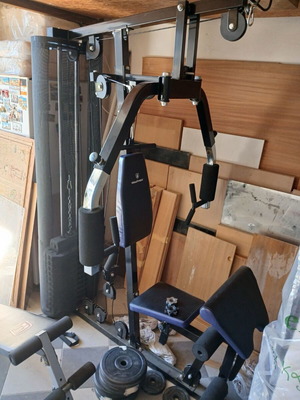Fitness multi-gym like new with approximately 80 kg weight plates