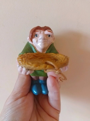 Disney figure Quasimodo holding a nest used