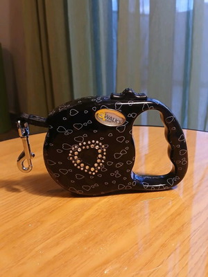 Retractable dog leash like new, up to 3 meters