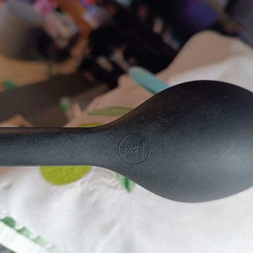 Kitchen serving utensils set like new, black plastic with turquoise handle